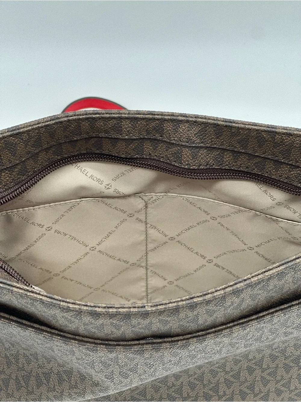 Michael Kors Brown Monogram Crossbody with Red Strap